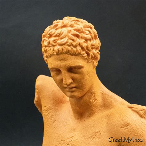 the god hermes by praxiteles